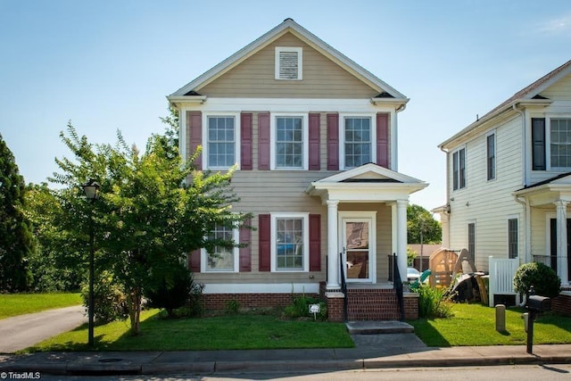 view of front of home featuring a front lawn