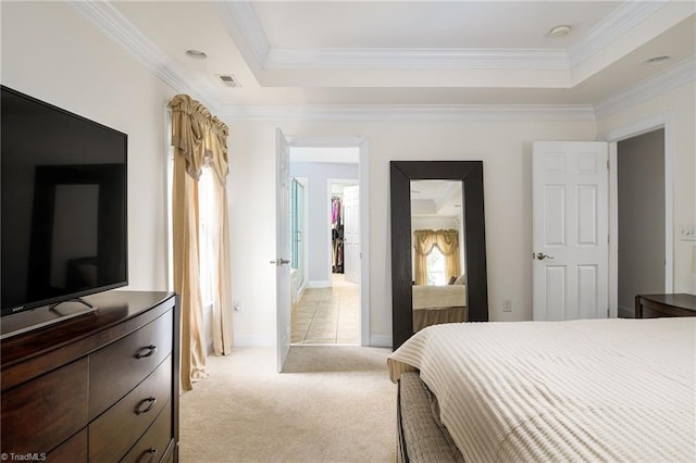 15 Orchard Grass Ct, Greensboro, NC 27410 - bedroom with light carpet, crown molding, a raised ceiling, and a spacious closet