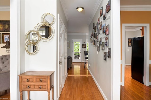 15 Orchard Grass Ct, Greensboro, NC 27410 - hallway featuring light wood-type flooring, ornamental molding, and baseboards