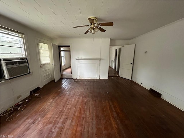 interior space with dark wood-type flooring, cooling unit, and ceiling fan