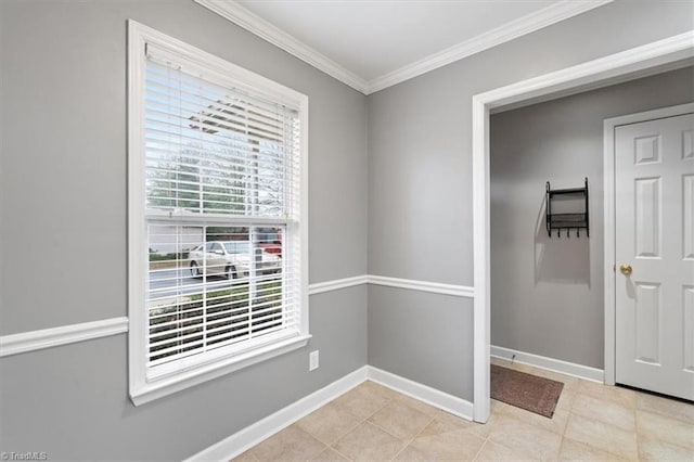 doorway to outside with crown molding and light tile patterned flooring