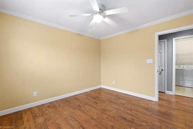 unfurnished room with washer and dryer, crown molding, wood finished floors, and a ceiling fan