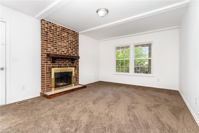 1 Red Fern Ct, Greensboro, NC 27455 - unfurnished living room featuring carpet, a fireplace, beam ceiling, and baseboards