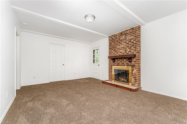 1 Red Fern Ct, Greensboro, NC 27455 - unfurnished living room with carpet flooring, a fireplace, and beamed ceiling