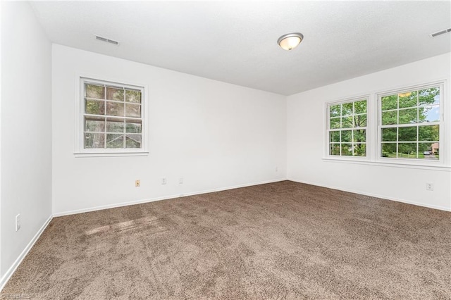 1 Red Fern Ct, Greensboro, NC 27455 - carpeted spare room featuring baseboards