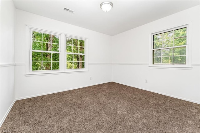 1 Red Fern Ct, Greensboro, NC 27455 - empty room with dark colored carpet and baseboards
