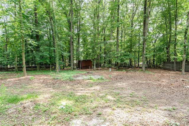 1 Red Fern Ct, Greensboro, NC 27455 - view of yard with a wooded view