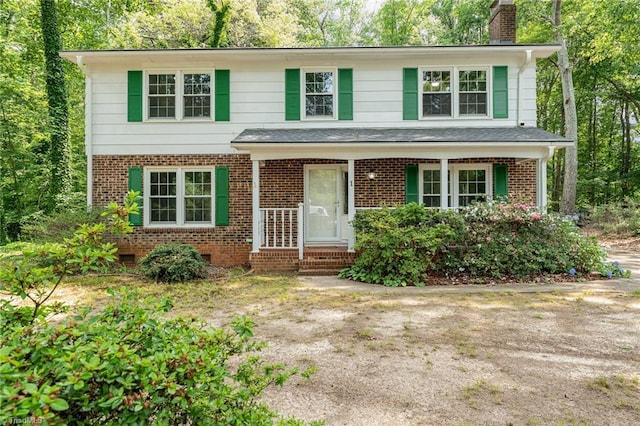 1 Red Fern Ct, Greensboro, NC 27455 - view of front of home with a chimney and brick siding