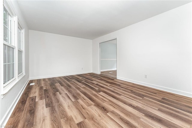 1 Red Fern Ct, Greensboro, NC 27455 - unfurnished room with wood finished floors and baseboards