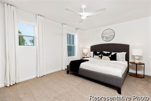 6926 Baler Way Unit 19, Thomasville, NC 27360 - carpeted bedroom with baseboards and a ceiling fan