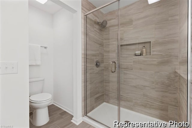 6926 Baler Way Unit 19, Thomasville, NC 27360 - full bathroom with a shower stall and wood finished floors