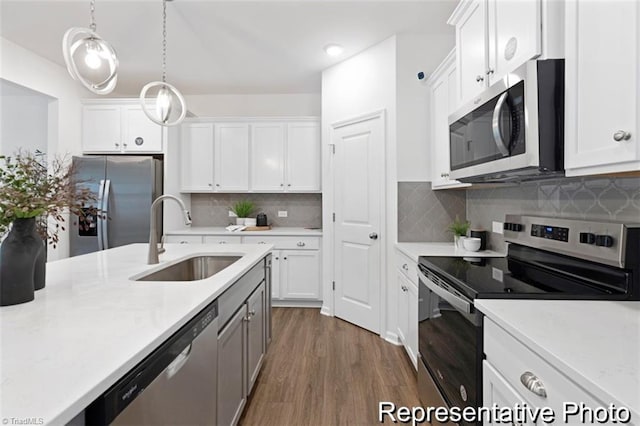 6926 Baler Way Unit 19, Thomasville, NC 27360 - kitchen with appliances with stainless steel finishes, dark wood-style floors, light countertops, white cabinetry, and recessed lighting