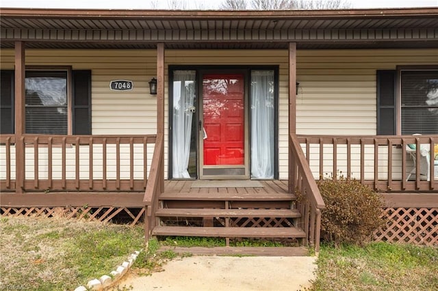 entrance to property with covered porch