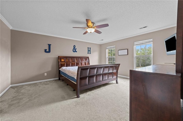 6416 Rock Springs Rd, Greensboro, NC 27410 - bedroom with ornamental molding, light carpet, a textured ceiling, and ceiling fan