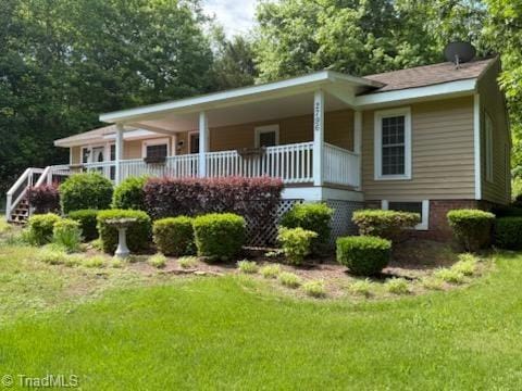 2796 Grant Trl, Randleman, NC 27317 - rear view of house with a lawn and a porch