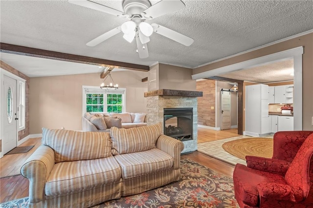 2796 Grant Trl, Randleman, NC 27317 - living area with wood finished floors, a textured ceiling, beamed ceiling, baseboards, and a ceiling fan