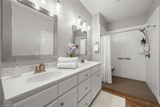 4215 Chippenham Ct, Graham, NC 27253 - bathroom featuring double vanity and a tile shower