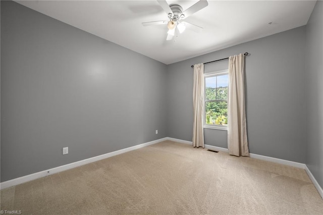 4215 Chippenham Ct, Graham, NC 27253 - unfurnished room with light carpet, baseboards, and ceiling fan