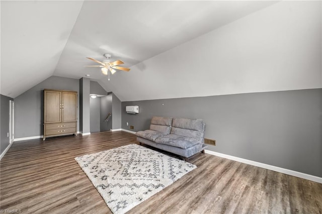 4215 Chippenham Ct, Graham, NC 27253 - sitting room with wood finished floors, a ceiling fan, vaulted ceiling, and baseboards
