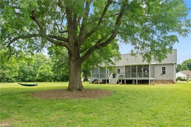 4215 Chippenham Ct, Graham, NC 27253 - view of grassy yard featuring a sunroom and a deck