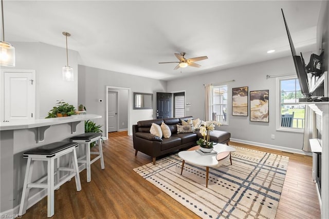 4215 Chippenham Ct, Graham, NC 27253 - living area with wood finished floors, ceiling fan, and baseboards