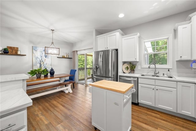 4215 Chippenham Ct, Graham, NC 27253 - kitchen featuring stainless steel appliances, a sink, healthy amount of natural light, white cabinetry, and recessed lighting