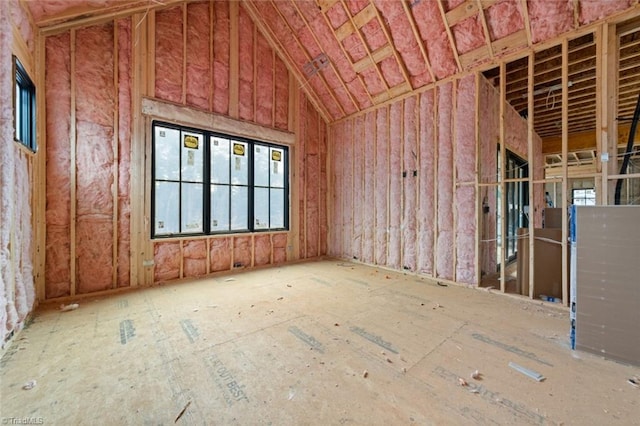 miscellaneous room with plenty of natural light and lofted ceiling