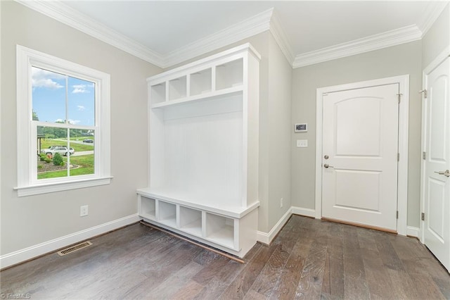 mudroom featuring visible vents, crown molding, baseboards, and wood finished floors