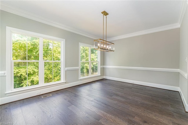 unfurnished dining area featuring crown molding, visible vents, dark wood finished floors, and a notable chandelier