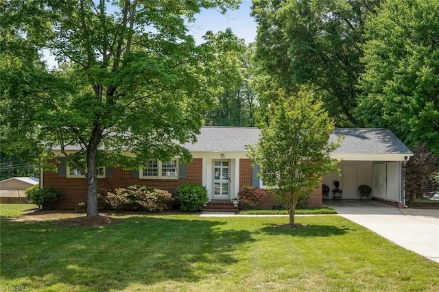 420 Shady Grove Rd, Eden, NC 27288 - ranch-style house featuring a front lawn, brick siding, entry steps, driveway, and a carport