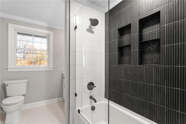 full bath with crown molding, bathtub / shower combination, toilet, tile patterned flooring, and baseboards