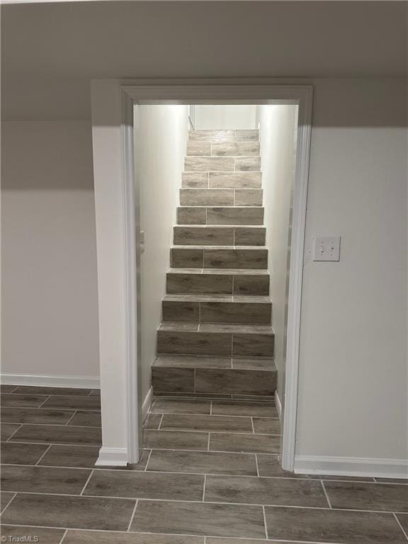 1230 W Sedgefield Dr, Winston-Salem, NC 27107 - stairway featuring wood tiled floors and baseboards