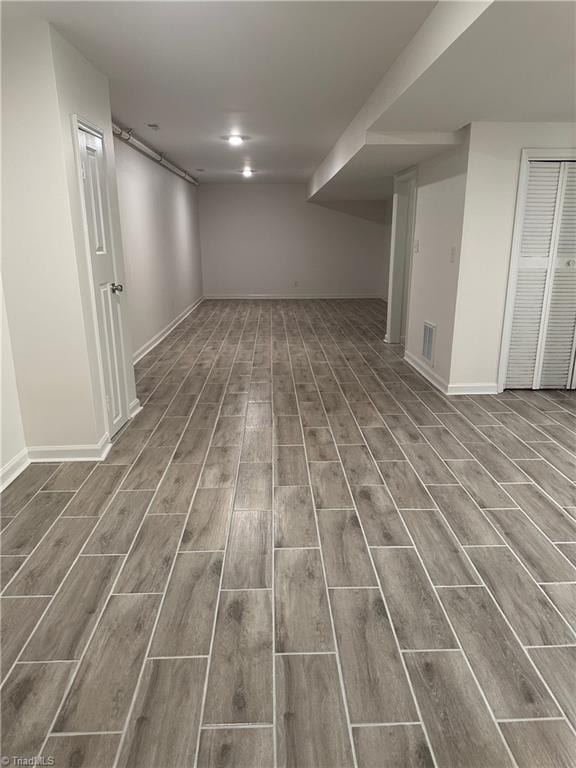 1230 W Sedgefield Dr, Winston-Salem, NC 27107 - finished below grade area with wood finished floors and baseboards