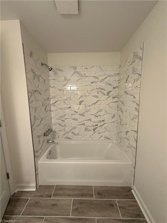 1230 W Sedgefield Dr, Winston-Salem, NC 27107 - full bath featuring shower / washtub combination, baseboards, and wood finish floors