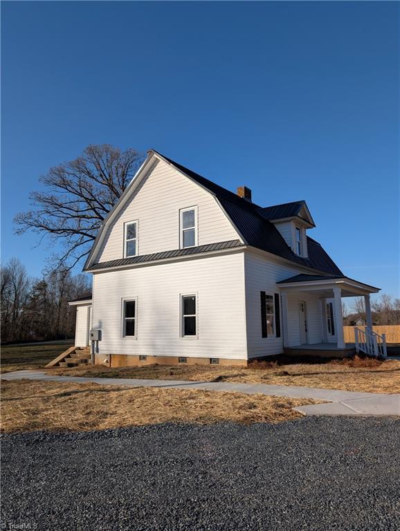 view of home's exterior with a porch