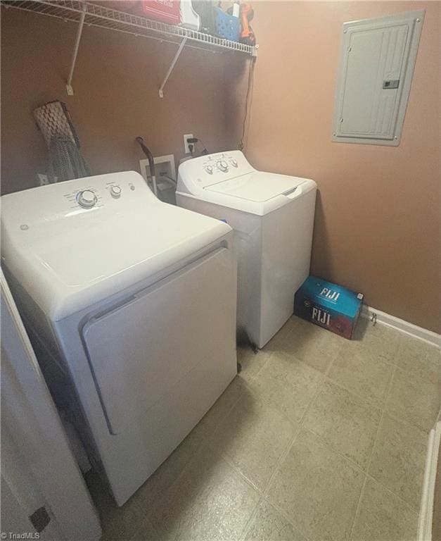 1620 Cherry Blossom Ln Unit 301, Winston-Salem, NC 27127 - laundry area with electric panel, washing machine and clothes dryer, and light floors