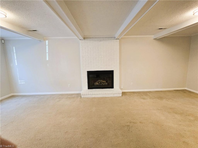 unfurnished living room featuring carpet floors, a brick fireplace, and a textured ceiling