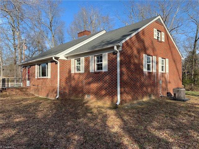 view of home's exterior with central AC unit