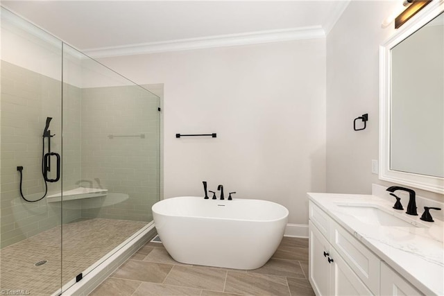 bathroom with ornamental molding, shower with separate bathtub, and vanity