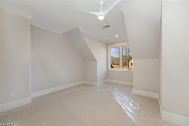 additional living space featuring lofted ceiling and ceiling fan