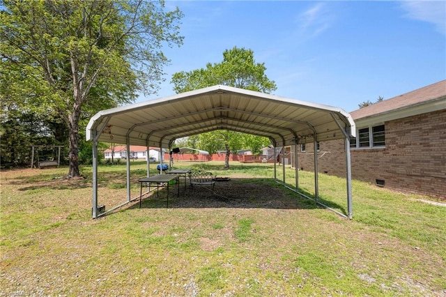 view of vehicle parking featuring a carport