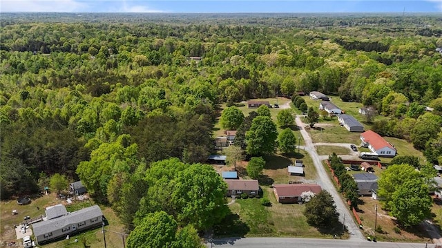 bird's eye view featuring a forest view