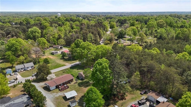 aerial view featuring a view of trees
