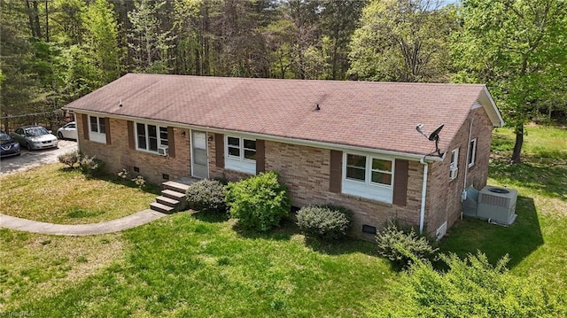 ranch-style home featuring brick siding, a front lawn, and crawl space