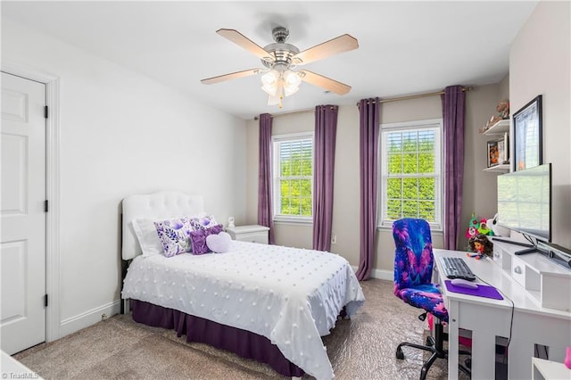 bedroom with carpet floors, baseboards, and ceiling fan