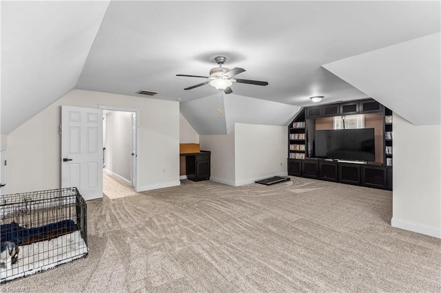 bonus room featuring baseboards, carpet, ceiling fan, and vaulted ceiling