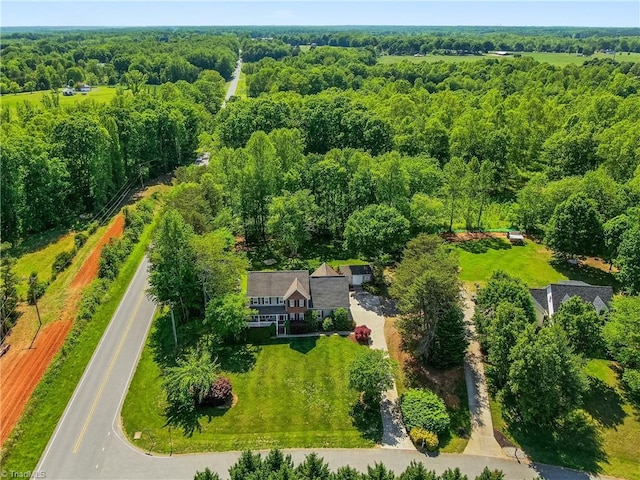 bird's eye view featuring a view of trees