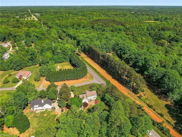 aerial view featuring a view of trees