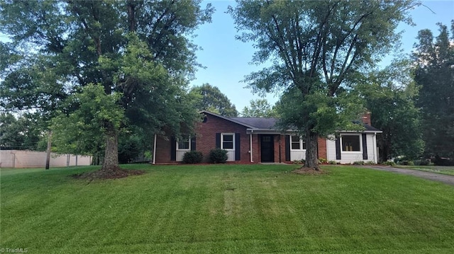 313 Farmstead Rd, King, NC 27021 - ranch-style home with a chimney