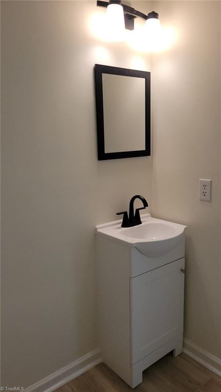 313 Farmstead Rd, King, NC 27021 - bathroom featuring vanity and wood finished floors